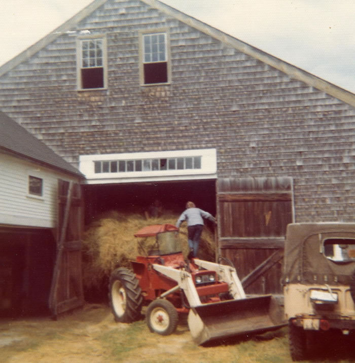 putting the hay in the barn