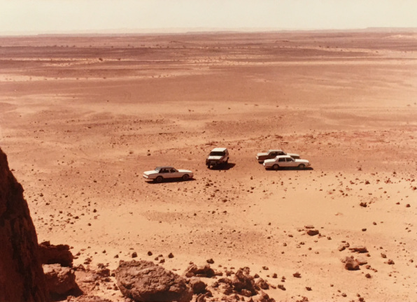 JECOR Cars parked at the base 
of the escarpment