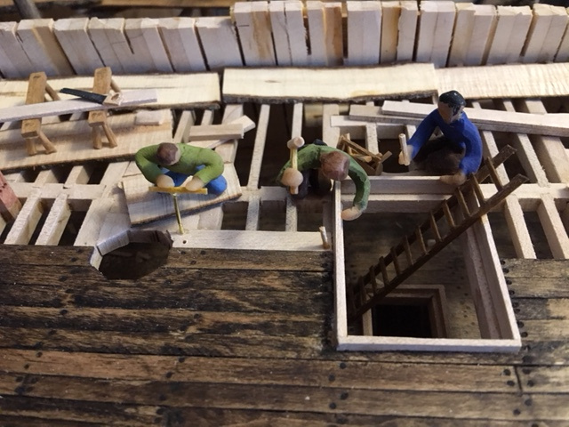 carpenters planking the deck