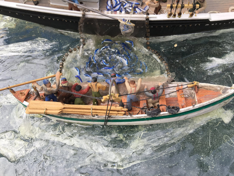 seine boat crew with stowed oars